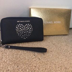 Authentic: Navy blue Michael Kors wristlet